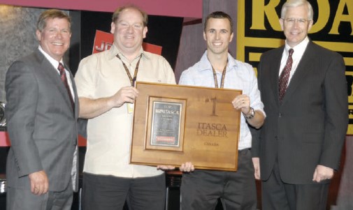 GM Ward Fraser (second from left) & VP Jason Friesen (second from right)accepting the Top Winnebago Itasca Dealer in Canada Award (2008)